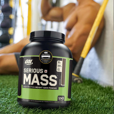 tub of serious mass with a man sitting down with a shake behind